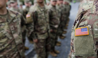 US soldiers with flag patch